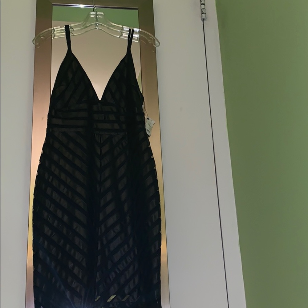 Faux leather black dress with straps
